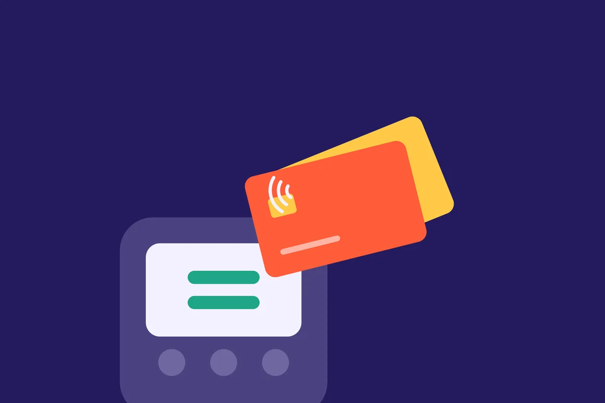 A coral card fans out over a marigold card above a card reader